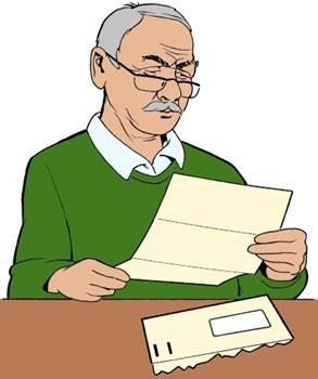 A man looking at a letter with confusion
